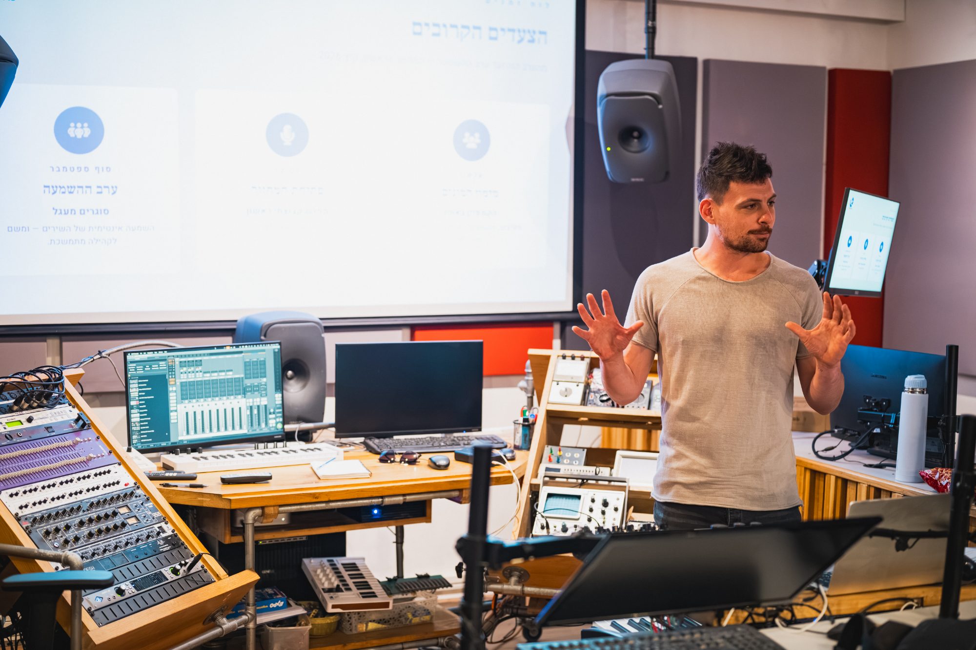 Facilitator speaking during a music production session